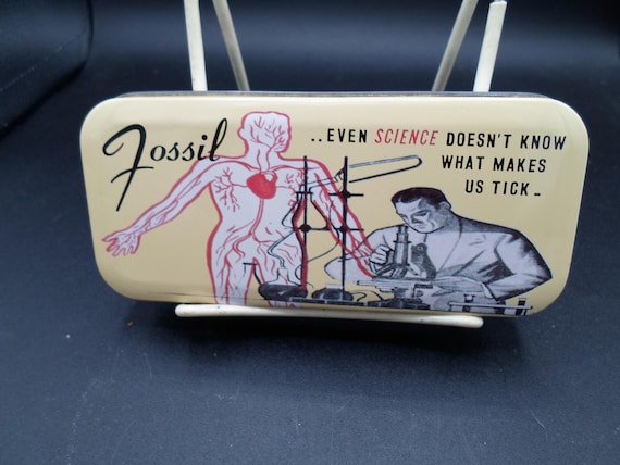 Vintage Fossil Watch Tin Even Science does not know What Makes us Tick 1991