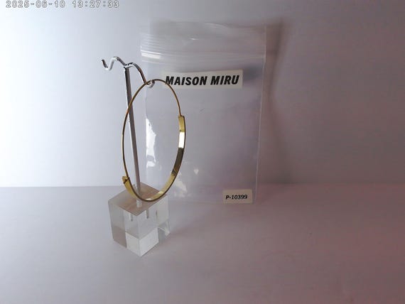 Maison Miru single gold tone plated large hoop earring, 2.5"