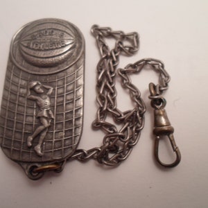 Cadena de reloj de bolsillo Art Deco vintage Figura atlética de un muchacho que se sujeta al cinturón Cadena para navaja de bolsillo Estilo de los años 20