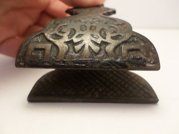 nice antique general store or office clip metal hands or desk top papers