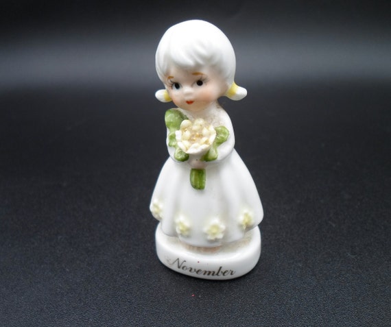 Vintage November Girl Figure Bone China 1960's Tiny chip on flower Kelvin
