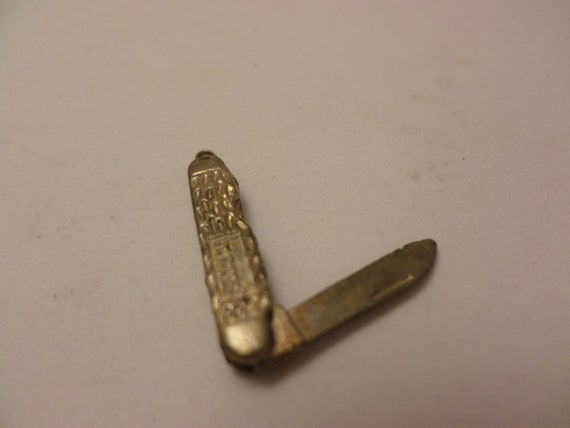 Vintage Intercast mini moving pocket knife charm premium or advertising