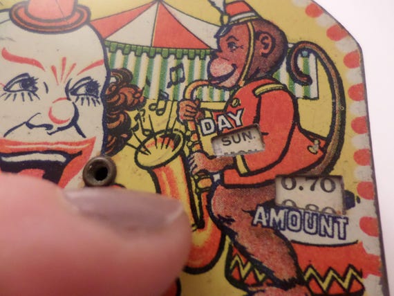 Antique circus metal pocket daily dime bank 5.00 clown monkey