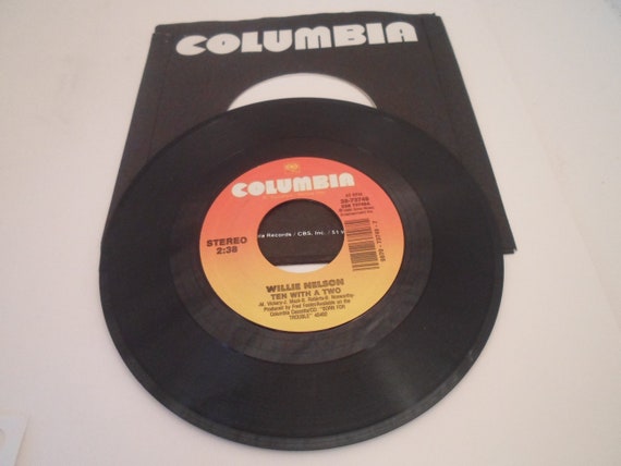 Vintage 90's 45 rpm vinyl record Willie Nelson Ten With A Two/You Decide with Columbia Sleeve