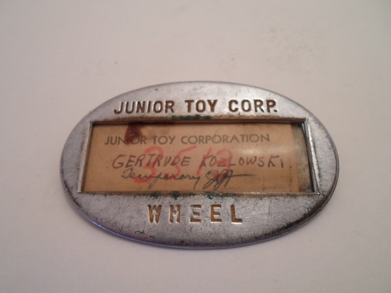 Antique WWII Junior Toy Corp Heavy Metal Employee Tag Wheel Department Hammond Indiana Rosie Riveter Working Job War Era
