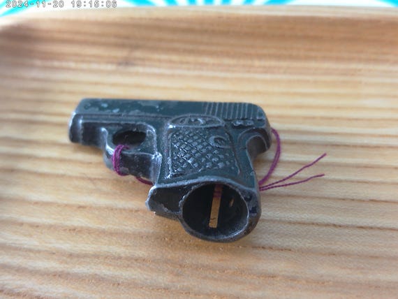 Antique TY Japan Metal Pencil Sharpener: Dick Tracy Style Gun