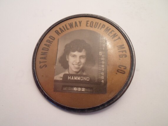 Antique WWII era Standard Railway Equipment Mgf company Picture Employee Badge Rail Road Trains War Time Rosie Riviter Metal