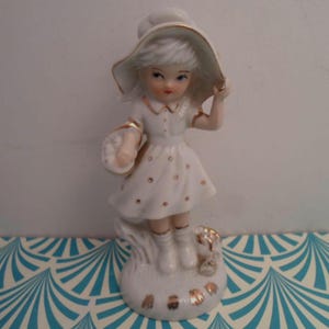 Vintage White Ceramic Girl Figurine: Gold Leaf Trim, Holly Hobby Style, 1970s