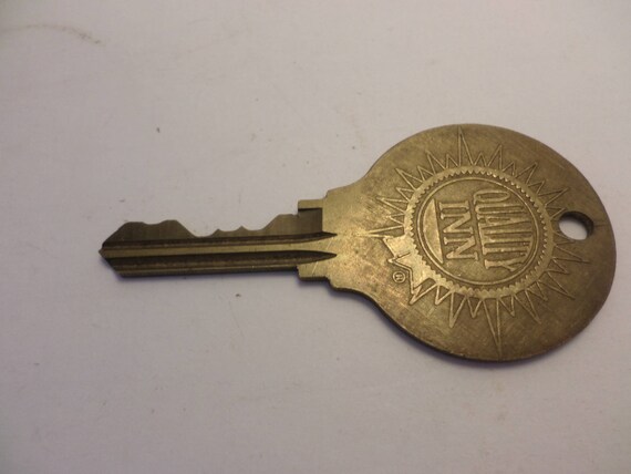 Vintage Quality Inn Hotel Key brass #183 hole to hang