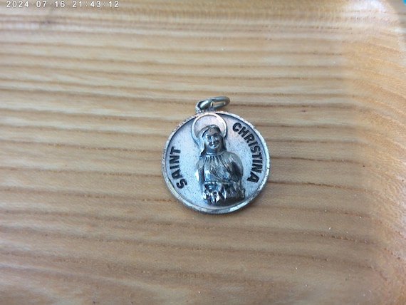 Vintage Creed Saint Christina religious medal Sterling Belgium born The Astonishing