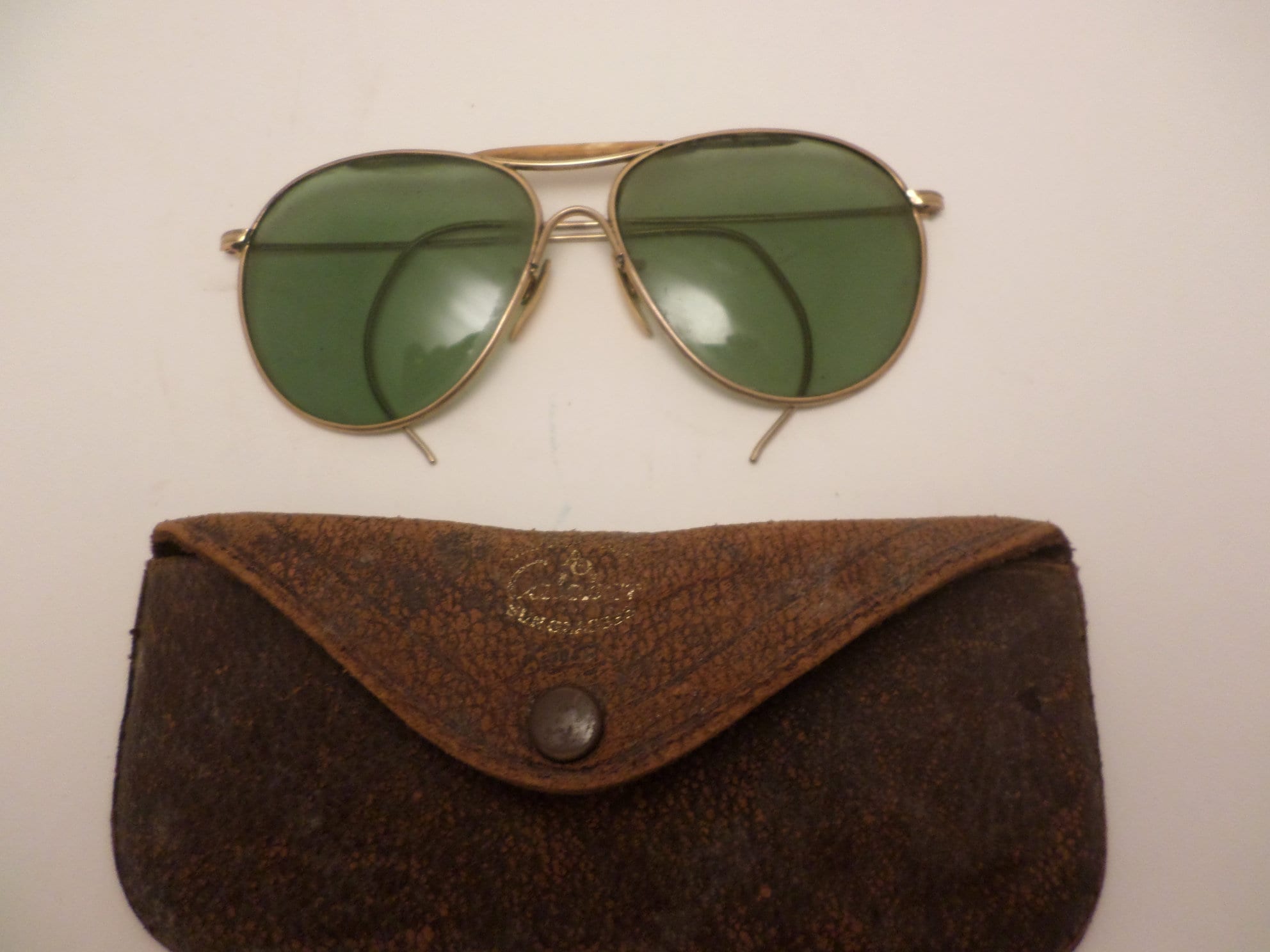 Vintage American Optical Aviators in original leather case gold tone