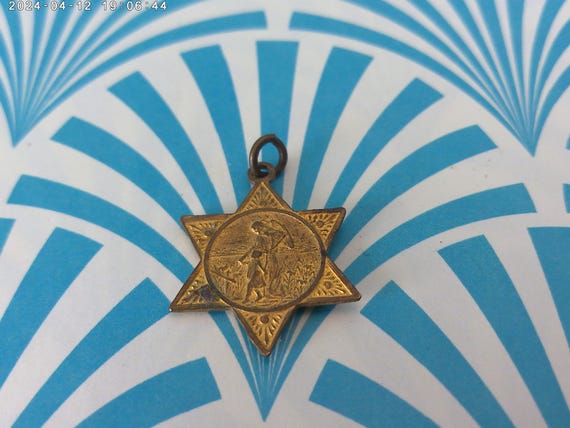 Antique gold tone religious medal, Guardian Angel, Baby Jesus vintage Catholic star