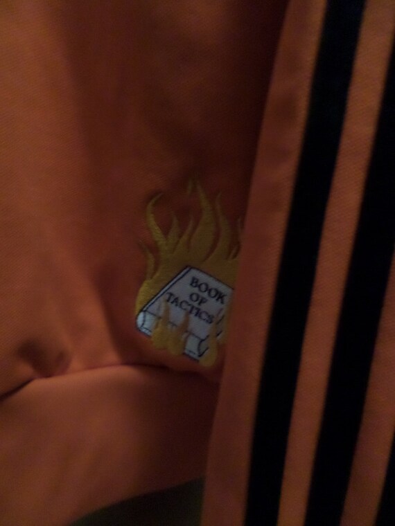 Orange adidas track jacket hotsell