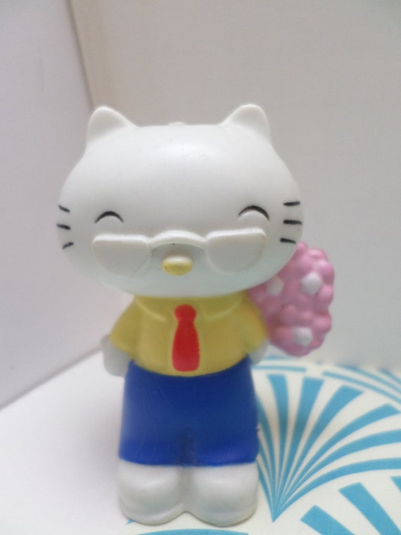 vintage 80's Sanrio Hello Kitty hard rubber Mr Kitty with flowers figure