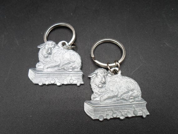 Vintage Pair of Keychains Lamb on Book with Page markers Reads Lednict 2000 Idz' za Barankiem