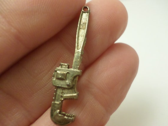 Vintage Intercast mini pipe wrench charm premium or advertising