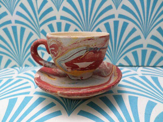 Antique child's cup and saucer swirled pottery 1940's era some chips on saucer niloak/nemadji style