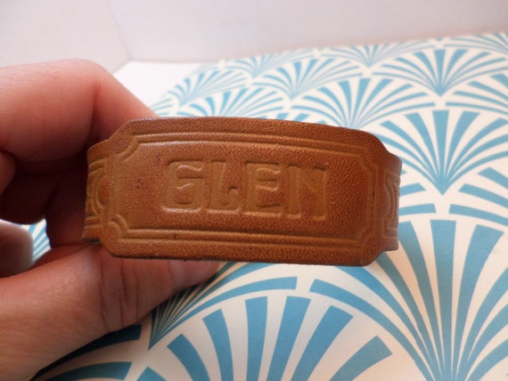 Vintage 70's Glen embossed leather wristband with stars tan snap