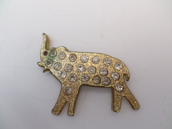Vintage lucite 50's pin brooch glittery gold with rhinestones and a red rhinestone eye super cute! Good Luck trunk up!