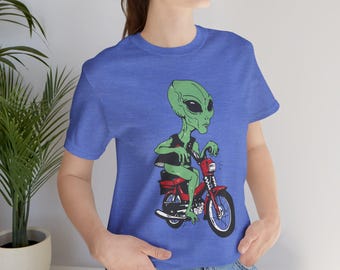 Retro Alien Moped Graphic Tee: Cosmic Illustrated T-Shirt