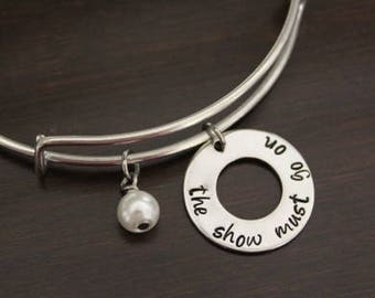 Hand Stamped Bangle Bracelet - The Show Must Go On - Inspiration - Inspirational Gift - Freddie Mercury - Queen Lyric - I/B/H