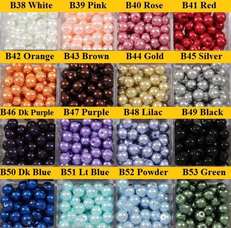 May include: A collection of 12 small containers filled with pearl beads in various colors, including white, pink, rose, red, orange, brown, gold, silver, dark purple, purple, lilac, black, dark blue, light blue, powder blue, and green. Each container is labeled with a color name and a code.