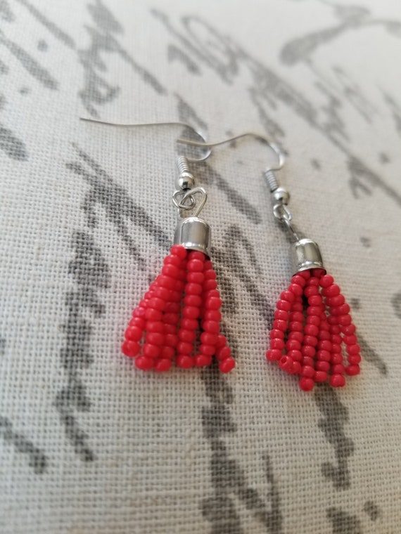 Red string earrings online