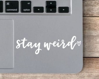 Stay Weird vinyldekal: Positiv laptopklistermärke