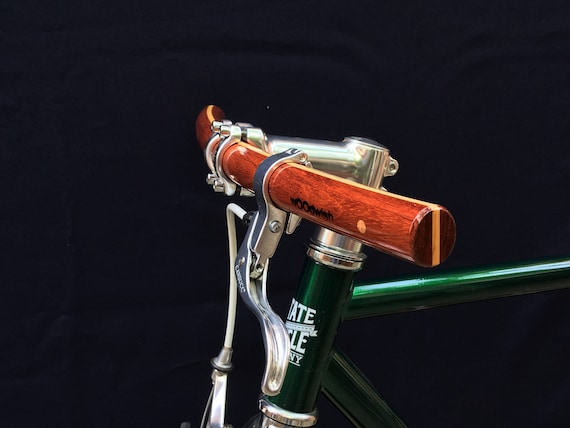 Curved bike best sale handlebars