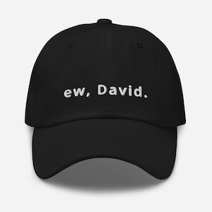 May include: Black baseball cap with white embroidered text that reads "ew, David."