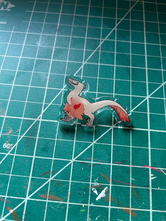 Pink the Velociraptor Acrylic Pin