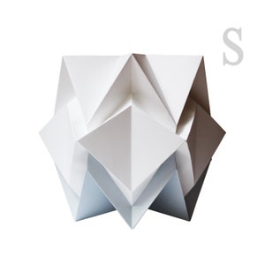 Cute lamp perfect for beside table or nursery made in paper using origami technique.