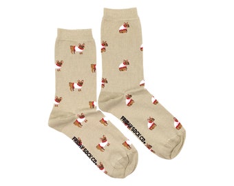 May include: A pair of beige socks with a repeating pattern of cartoon French Bulldogs wearing red and white sweaters. The socks have a ribbed cuff and the text "FRIDAY SOCK CO." printed on the sole.