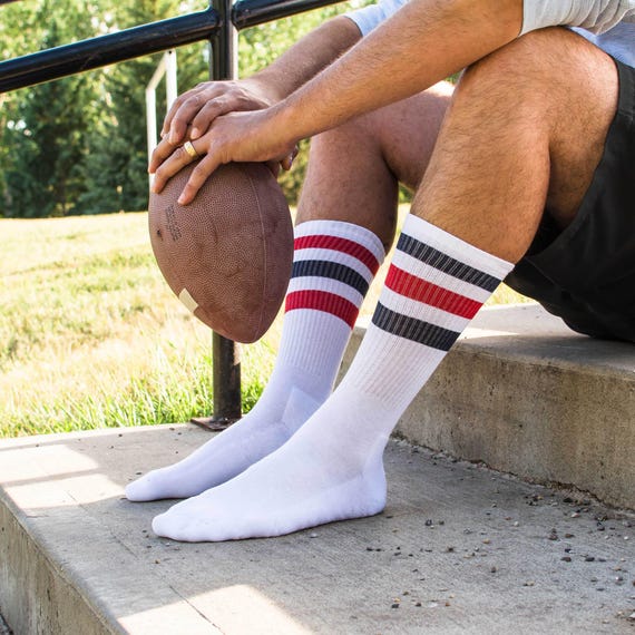 Athletic tube socks with stripes discount