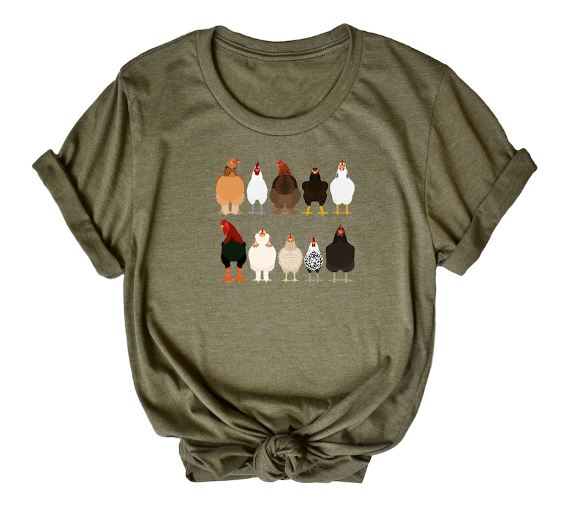 May include: A green t-shirt featuring a graphic of a line of chickens in different colours and breeds.