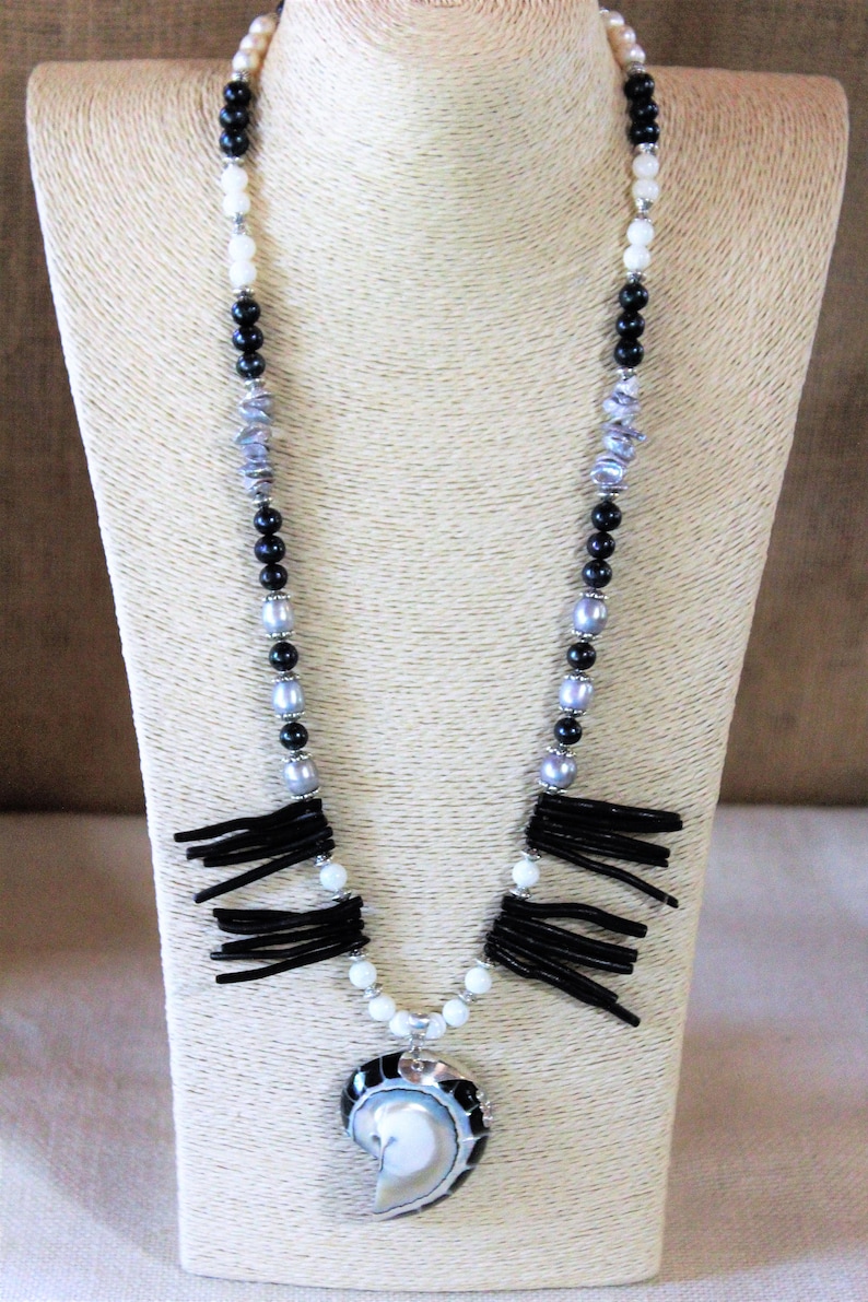 whimsical long strand Black and white coral beaded necklace with nautilus pendant pearl and coral statement necklace gift for her