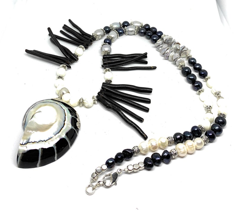 whimsical long strand Black and white coral beaded necklace with nautilus pendant pearl and coral statement necklace gift for her