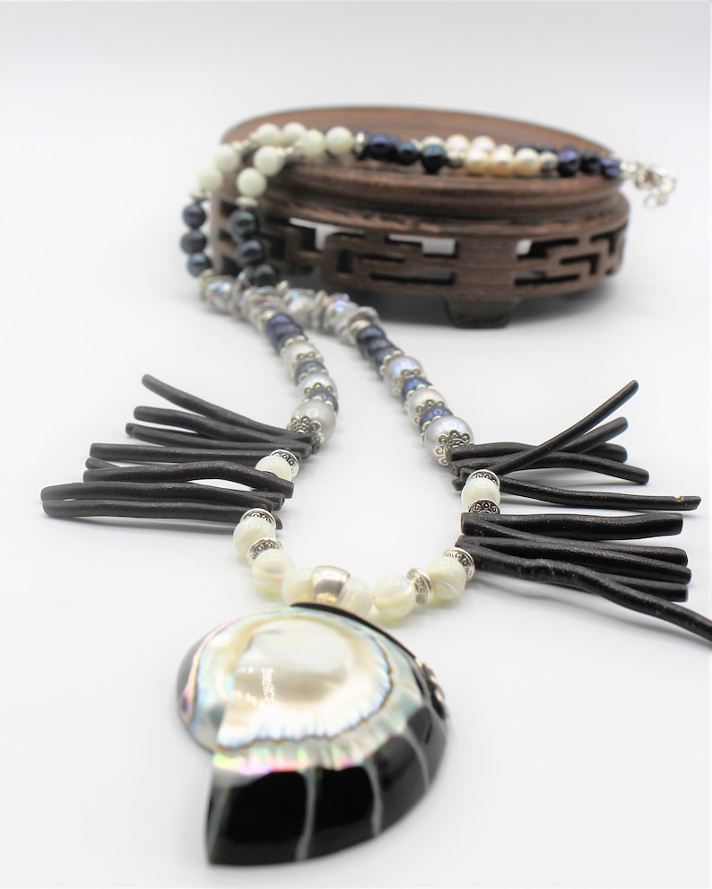 whimsical long strand Black and white coral beaded necklace with nautilus pendant pearl and coral statement necklace gift for her