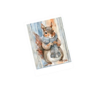 May include: A watercolor painting of a squirrel wearing a blue and white scarf. The squirrel is standing on a wooden surface with a blue and white background.