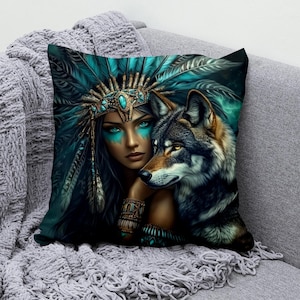 May include: A woman with blue eyeshadow and a turquoise headdress is holding a wolf. The wolf has brown and grey fur. The background is dark green and blue.