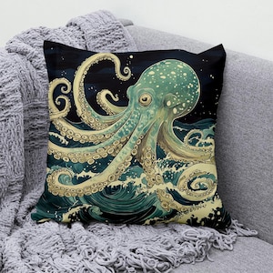 May include: A decorative cushion featuring a colourful illustration of an octopus with tentacles reaching out of the water. The octopus is green and blue with white spots and is surrounded by swirling waves.