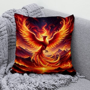May include: A fiery orange and yellow phoenix bird with outstretched wings, rising from a landscape of red and orange flames and mountains. The phoenix is a mythical creature that symbolizes rebirth and renewal.