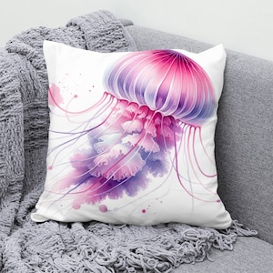 May include: A watercolor painting of a pink and purple jellyfish on a white background. The jellyfish has long, flowing tentacles and a bell-shaped body.