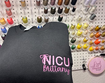 Customizable Coquette Bow NICU left chest logo with name crewneck sweatshirt, gift for nurse