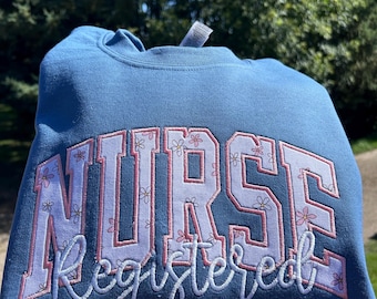 Fabric Appliqué Registered Nurse Sweatshirt with stethoscope sleeve Embroidery