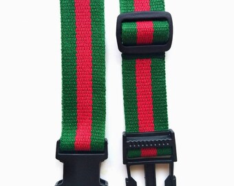 red luggage strap