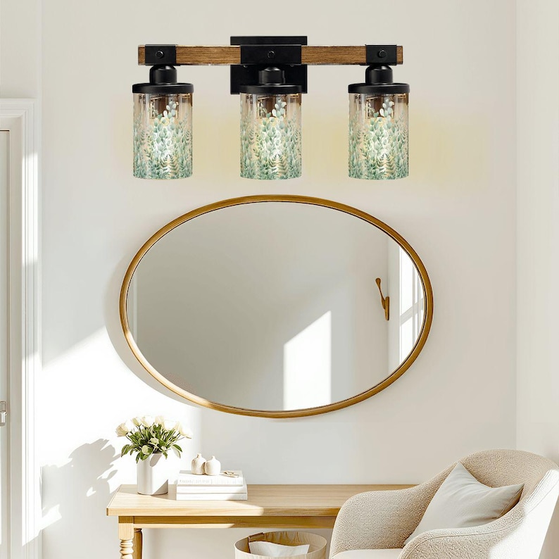 Upgrade your space with a Bathroom Vanitylight designed as a 3 Light Wood Vanity Light, blending a Rustic Vanity look with a Modern Vanity Wall Light style using Metal Glass and Colored Sconce accents for a Luxury finish.