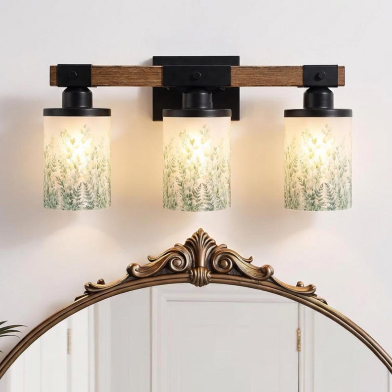 Upgrade your space with a Bathroom Vanitylight designed as a 3 Light Wood Vanity Light, blending a Rustic Vanity look with a Modern Vanity Wall Light style using Metal Glass and Colored Sconce accents for a Luxury finish.
