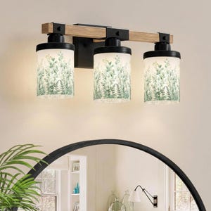 Bathroom Vanitylight with a modern Vanity Light Fixture design featuring a 3 Light Wood Vanity Light, perfect for upgrading a Rustic Vanity with warm lighting and a Colored Sconce style, combining Metal Glass details for a Luxury bathroom feel.