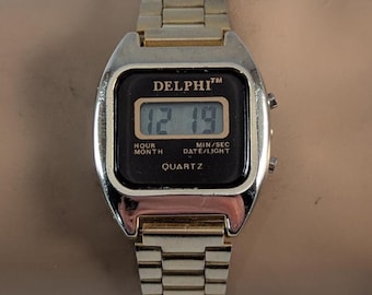 1980s Delphi Quartz LCD Digital Woman's Watch - Vintage Gold Tone